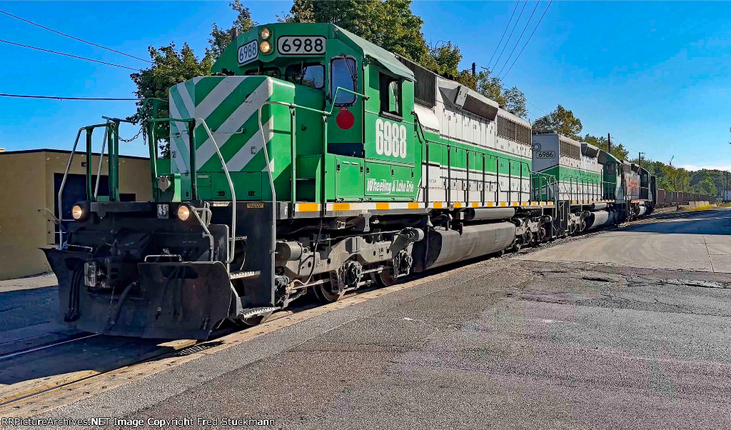 WE 6988 lifts the train out of Rock Cut Siding.